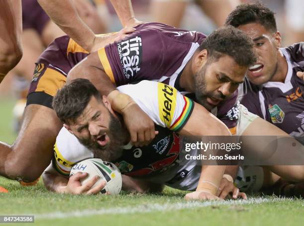 James Tamou of the Panthers is tackled during the NRL Semi Final match between the Brisbane Broncos and the Penrith Panthers at Suncorp Stadium on...