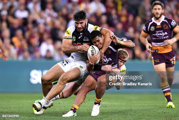 Anthony Milford of the Broncos is wrapped up by the defence during the NRL Semi Final match between the Brisbane Broncos and the Penrith Panthers at...