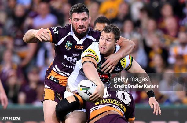 Trent Merrin of the Panthers offloads during the NRL Semi Final match between the Brisbane Broncos and the Penrith Panthers at Suncorp Stadium on...