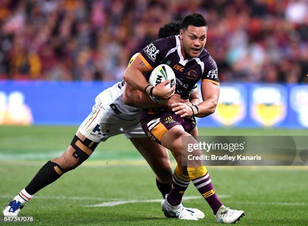 Alex Glenn of the Broncos is tackled during the NRL Semi Final match between the Brisbane Broncos and the Penrith Panthers at Suncorp Stadium on...