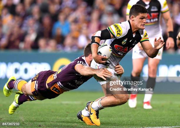 Nathan Cleary of the Panthers attempts to break free from the defence during the NRL Semi Final match between the Brisbane Broncos and the Penrith...