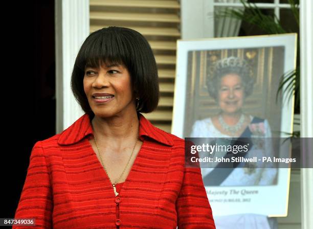 The Prime Minister of Jamaica, Portia Simpson Miller, waits to greet Prince Harry at Devon Hall , in Jamaica where the prince arrived late yesterday...