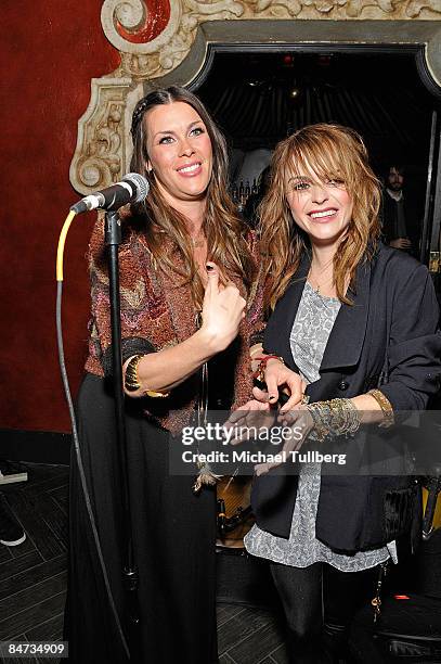 Actress Taryn Manning and fashion designer Tara Jane looking at the crowd at the Born Uniqorn Summer 2009 Collection Launch party benefit for LA's...