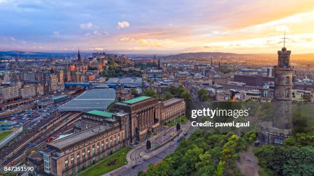 aerial view of edinburgh during sunset - edinburgh stock pictures, royalty-free photos & images