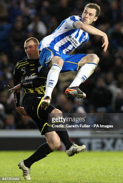 Brighton's Ashley Barnes leaps to score his side's first goal during the npower Championship match at the AMEX Stadium, Brighton.