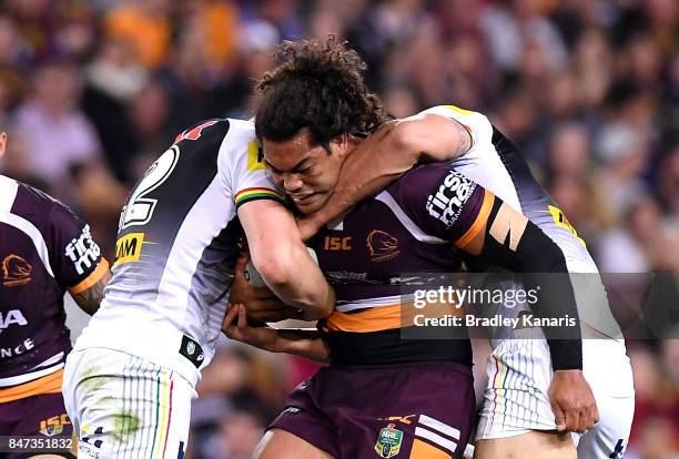 Adam Blair of the Broncos is tackled during the NRL Semi Final match between the Brisbane Broncos and the Penrith Panthers at Suncorp Stadium on...