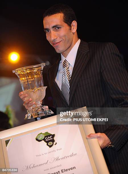 Egyptian and Al-Ahly striker Mohammed Aboutreika holds the Inter-Club Player of the Year Award at the Confederation of African Football awards...