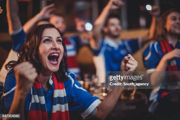 girl celebrating with friends - fan enthusiast stock pictures, royalty-free photos & images