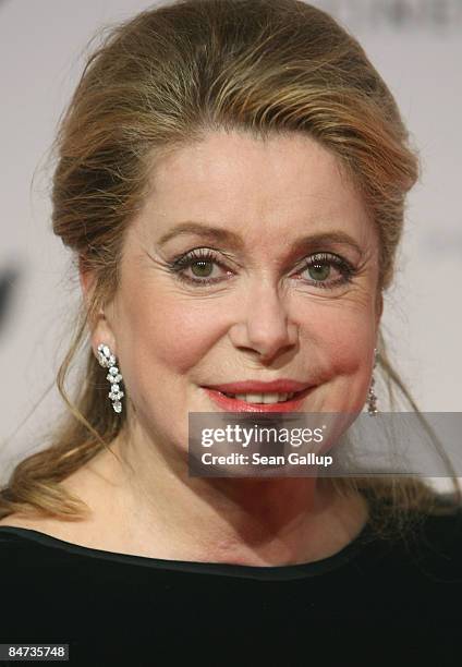 Actress Catherine Deneuve attends the 'Cinema For Peace Berlin 2009' during the 59th Berlin International Film Festival at the Konzerthaus am...