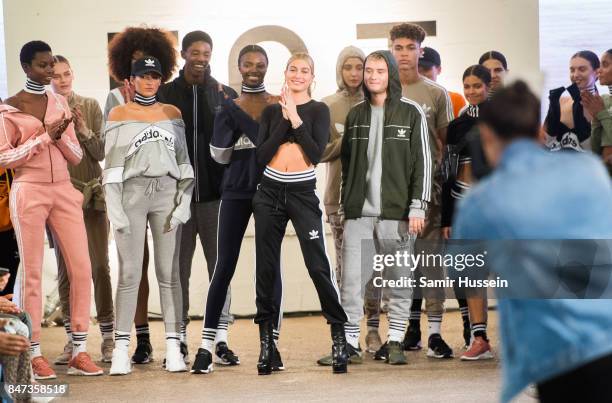 Hailey Baldwin and Rafferty Law attend Streets of EQT, a fashion show celebrating street style at The Old Truman Brewery on September 15, 2017 in...