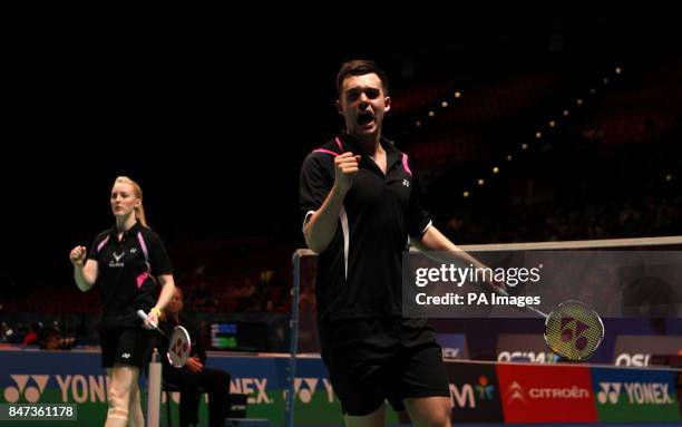 England's Chris Adcock and Scotland's Imogen Bankier celebrate a point on their way to victory over Korea's Yeon Seong Yoo and Ye Na Jang during the...