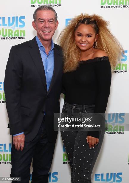 Elvis Duran poses for photos with singer Rachel Crow during "The Elvis Duran Z100 Morning Show" at Z100 Studio on September 15, 2017 in New York City.