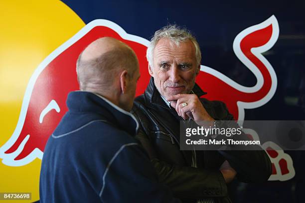 The owner of Red Bull Dieter Mateschitz of Austria and team Red Bull Racing chief technical officer Adrian Newey talk in the pits during Formula 1...