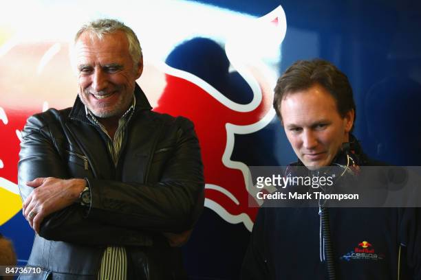 The owner of Red Bull Dieter Mateschitz of Austria and team Red Bull Racing team principal Christian Horner talk in the pits during Formula 1 testing...