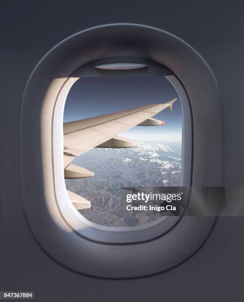 view from a airplane - windows imagens e fotografias de stock