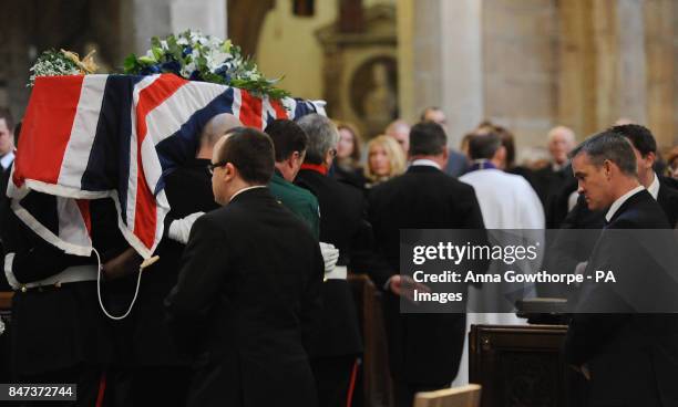 Darren Rathband , twin brother of David Rathband, looks down as his coffin is carried away after a memorial service at St Nicholas Cathedral,...