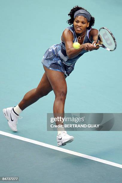 Serena Williams hits a return to her Czech opponent Iveta Benesova during their 17th WTA French Open tennis match on February 11, 2009 in Paris. AFP...