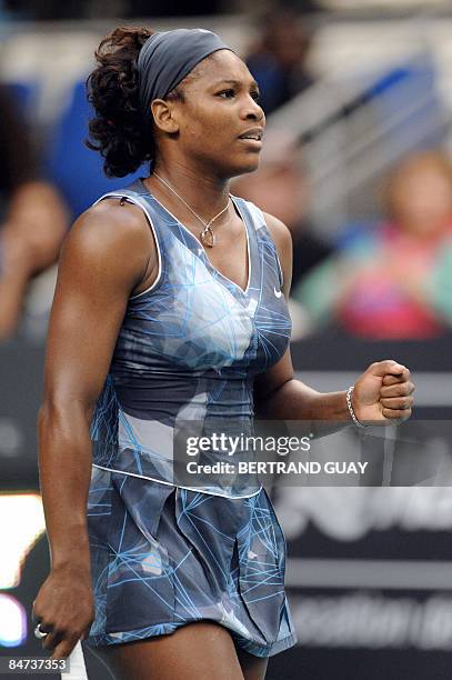 Serena Williams reacts after winning against Czech opponent Iveta Benesova during their 17th WTA French Open tennis match on February 11, 2009 in...