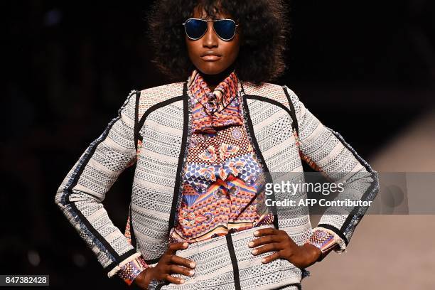 Model presents a creation of Ion Fiz's Spring/Summer 2018 collection during the Madrid Fashion Week in Madrid on September 15, 2017. / AFP PHOTO /...