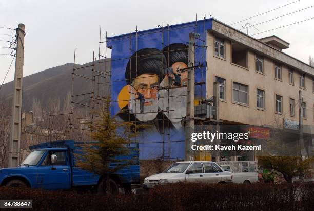 Mural of Iran's supreme leader Ayatollah Ali Khamenei and the founder of the Islamic Republic Ayatollah Khomeini painted on a wall in Fasham, Iran,...