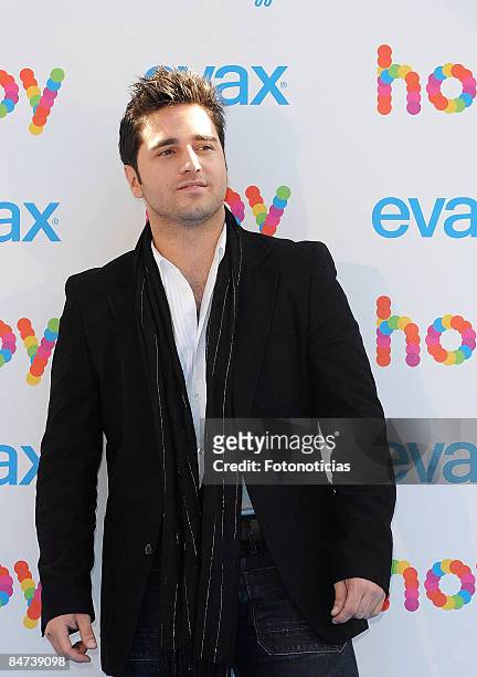 Singer David Bustamante attends a promotional photocall for EVAX, at Centro Comercial Moda Shopping on February 11, 2009 in Madrid, Spain