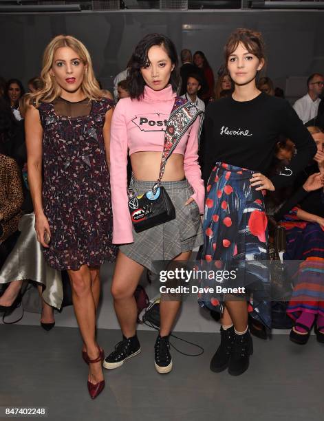 Olivia Cox, Betty Bachz and Ella Hunt attend the Eudon Choi show during London Fashion Week September 2017 at BFC Show Space on September 15, 2017 in...