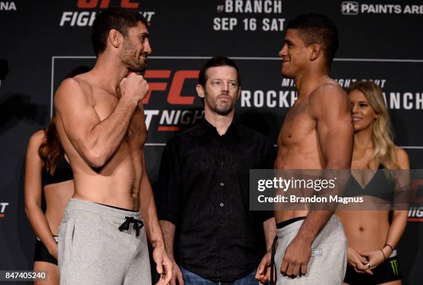 Jason Saggo of Canada and Gilbert Burns of Brasil face off during the UFC Fight Night Weigh-in on September 15, 2017 in Pittsburgh, Pennsylvania.