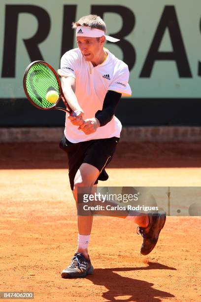 Cedrik-Marcel Stebe of Germany celebrates winning the match against Joao Sousa of Portugal during day one of the Davis Cup World Group Play-off...