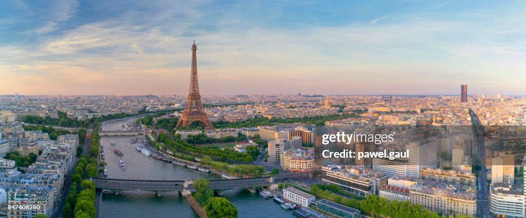 Aerial view of Paris with Eiffel tower during sunset