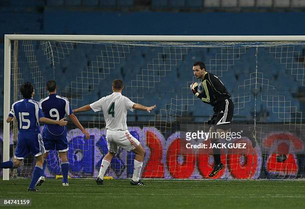 Hungary�s goalkeeper Fulop Marton competes with Israel's players during their international friendly football match on February 11, 2009 at Ramat Gan...