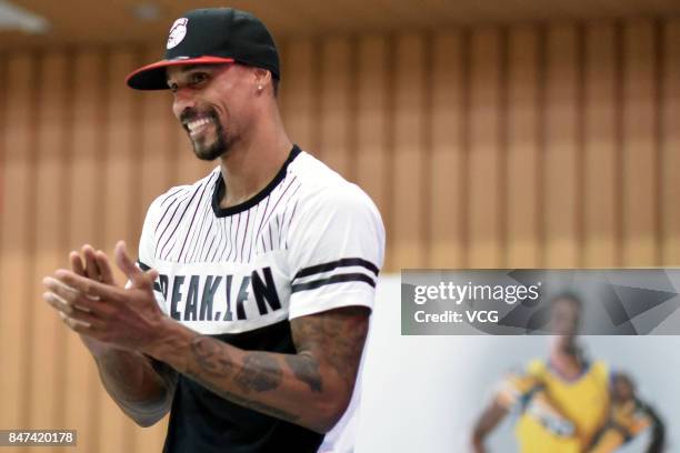 Player George Hill of the Sacramento Kings plays basketball with children at a kindergarten on September 15, 2017 in Guangzhou, China.