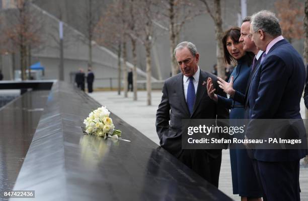 Prime Minister David Cameron and his wife Samantha talk with Charles Wolf - who lost his wife Katherine during the terrorist attacks on September 11...