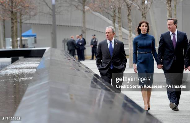Prime Minister David Cameron, his wife Samantha and New York Mayor Michael Bloomberg arrive at Ground Zero in New York, where Mrs Cameron laid...