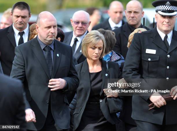 Kath Rathband , the widow of Pc David Rathband, attends his funeral at Stafford Crematorium.