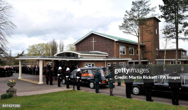 The coffin of Pc David Rathband arrives for his funeral at Stafford Crematorium.