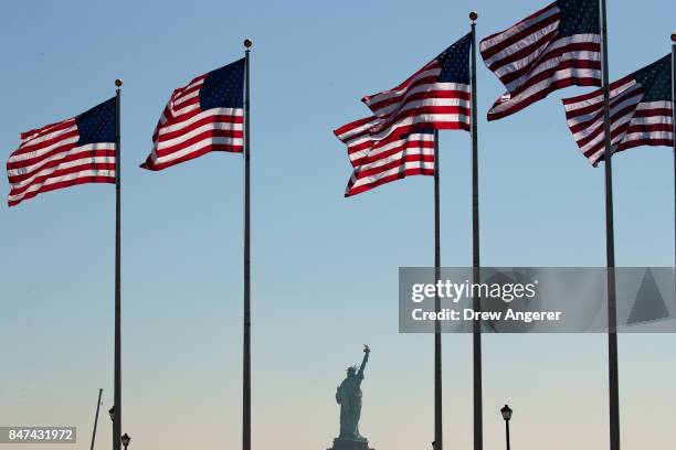 View of the Statue of Liberty during a naturalization ceremony at Liberty State Park, September 15, 2017 in Jersey City, New Jersey. To mark...