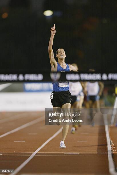 Alan Culpepper celebrates as he heads for the finish line in the men's 5000 meter run finals during the 2002 USA Outdoor Track & Field Championships...
