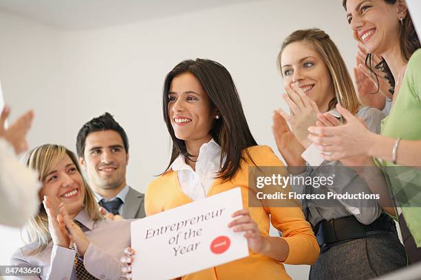 businesswoman receiving commendation - respect awards inside stockfoto's en -beelden