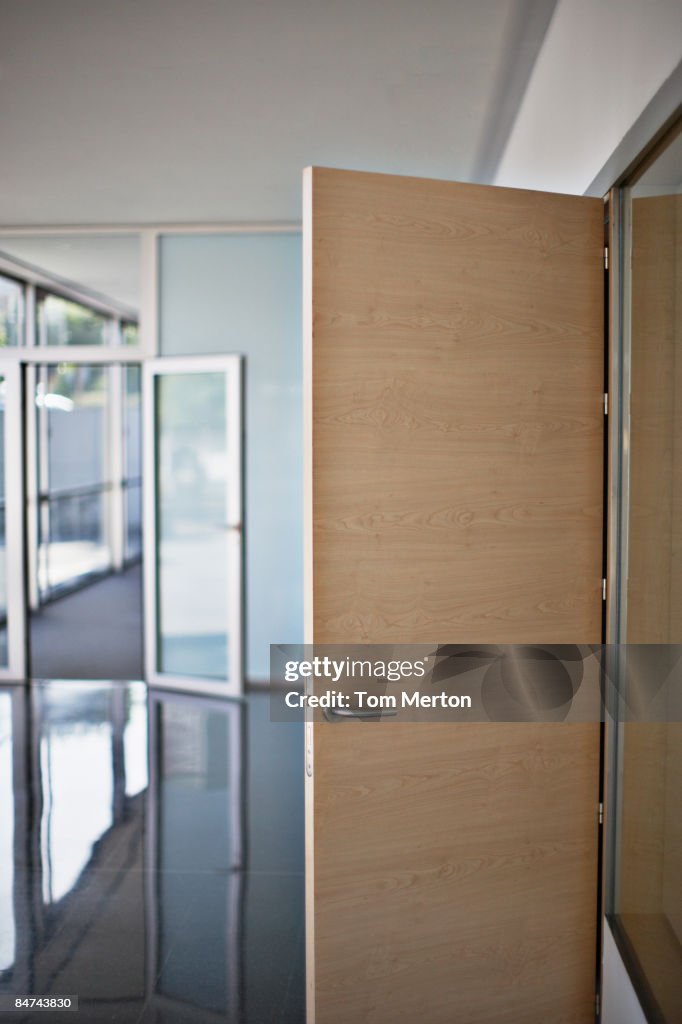 Open door in office building