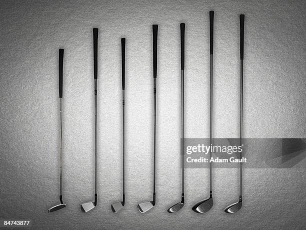 set of golf clubs - golfclub stockfoto's en -beelden