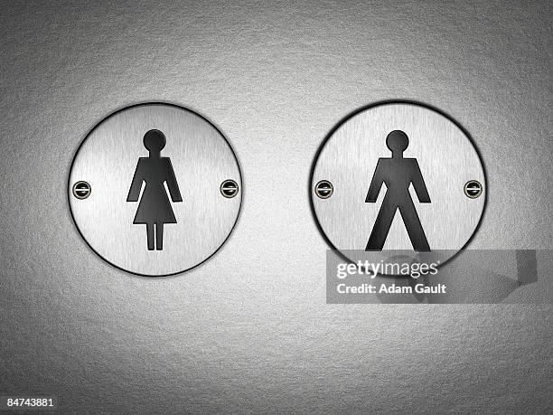 close up of bathroom symbol - restroom sign stock-fotos und bilder