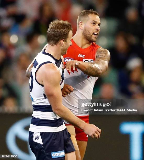 Lachie Henderson of the Cats has a word to Lance Franklin of the Swans during the 2017 AFL Second Semi Final match between the Geelong Cats and the...