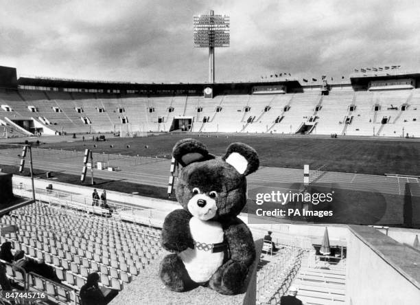 Misha the bear, the official mascot for this year's Olympics, sets the scene at the Lenin Central Stadium in Moscow, the venue for the track and...