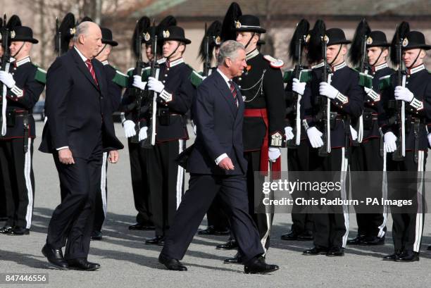 The Prince of Wales accompanied by King Harald of Norway inspects the guard, during a wreath laying ceremony at the National Monument, Akershus...