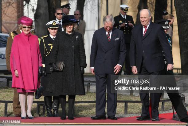 The Prince of Wales and Duchess of Cornwall are accompanied by King Harald and Queen Sonja of Norway, during a wreath laying ceremony at the National...
