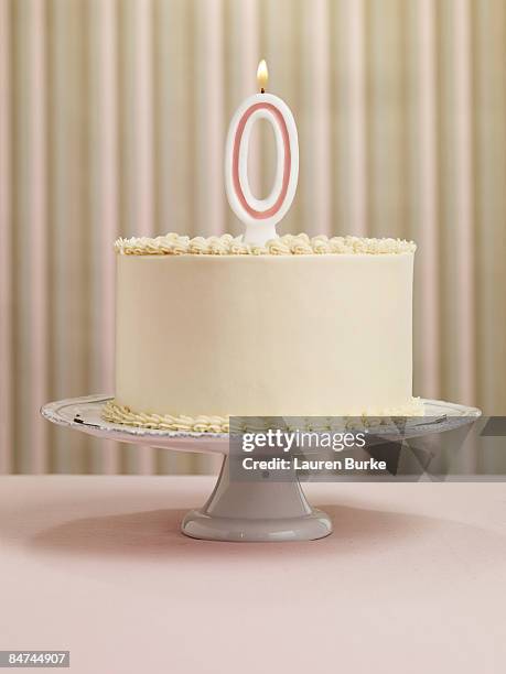 birthday cake with number 0 candle - number candles stock pictures, royalty-free photos & images