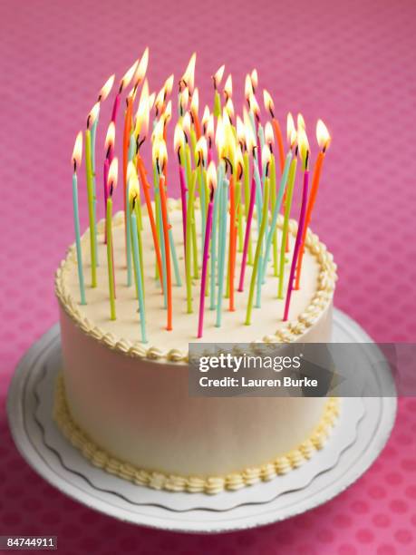 birthday cake with many candles - birthday cake stock pictures, royalty-free photos & images