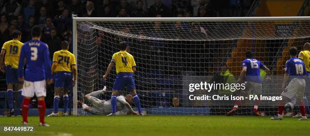 Porsmouth's Chris Maguire scores during the npower Championship match at Fratton Park, Portsmouth.