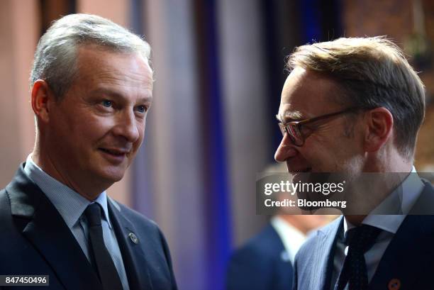 Bruno Le Maire, France's finance minister, left, speaks with Jens Weidmann, president of the Deutsche Bundesbank, following the Eurogroup meeting in...