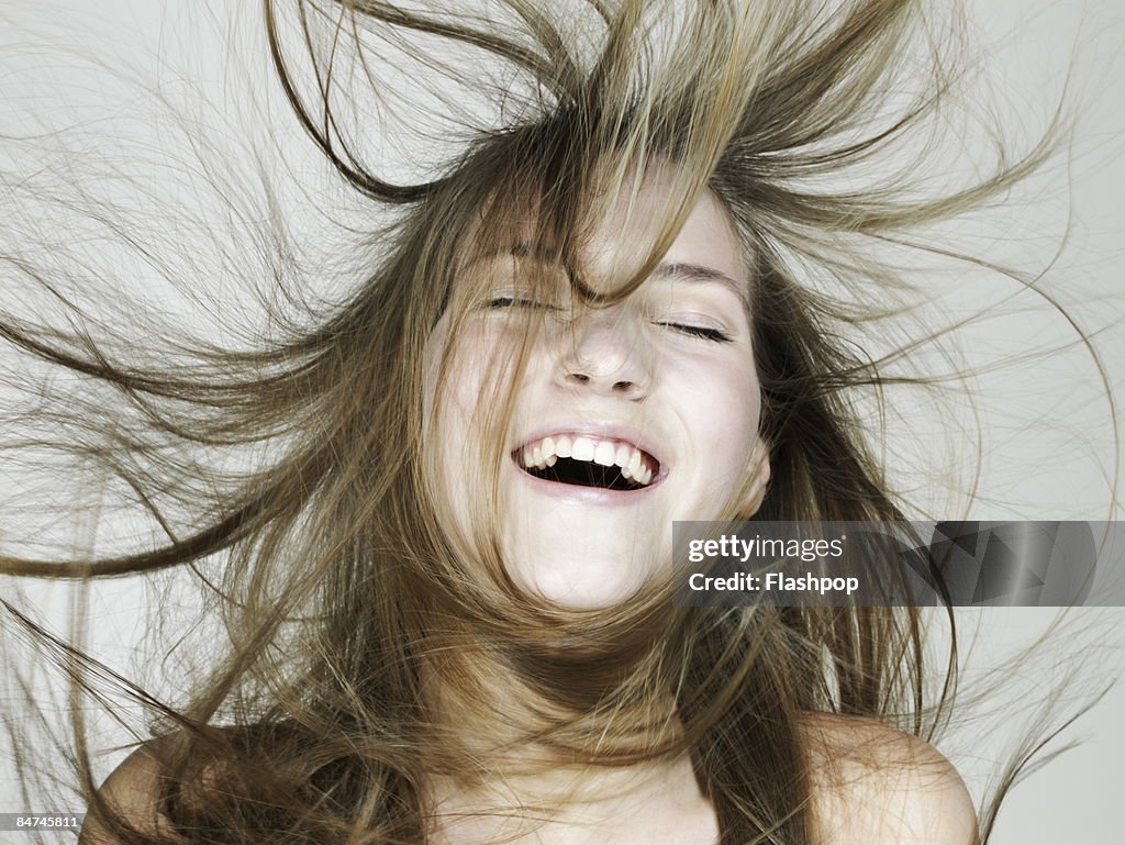 Portrait of woman laughing